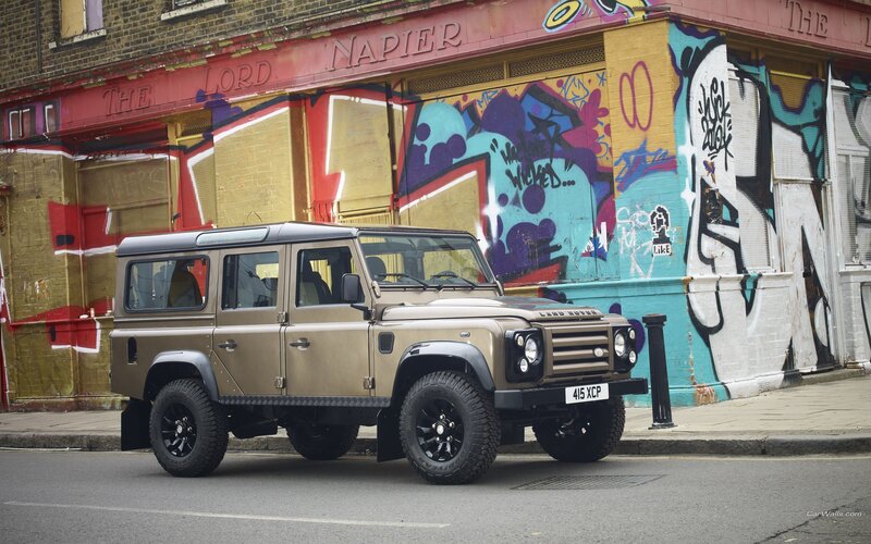 Land Rover Defender on a graffiti street
