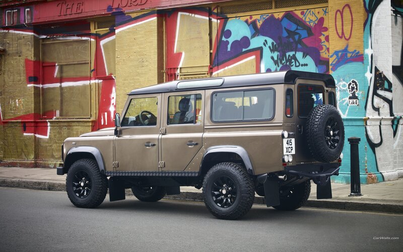 Land Rover Defender on a graffiti street