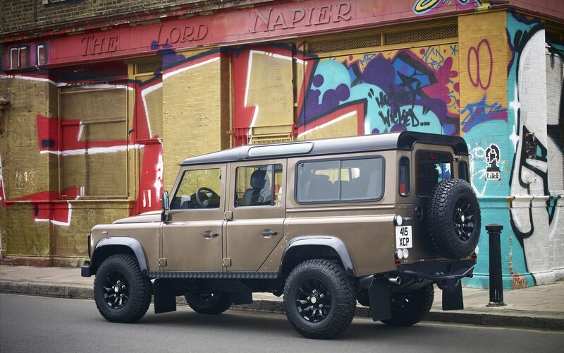 Land Rover Defender on a graffiti street