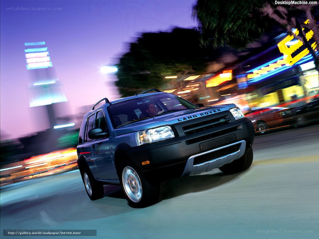 Land Rover driving at night