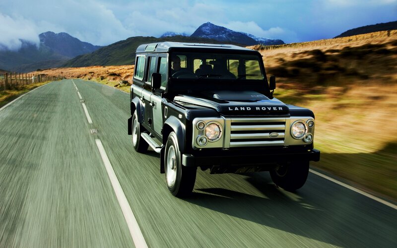 Land Rover driving on a mountain road