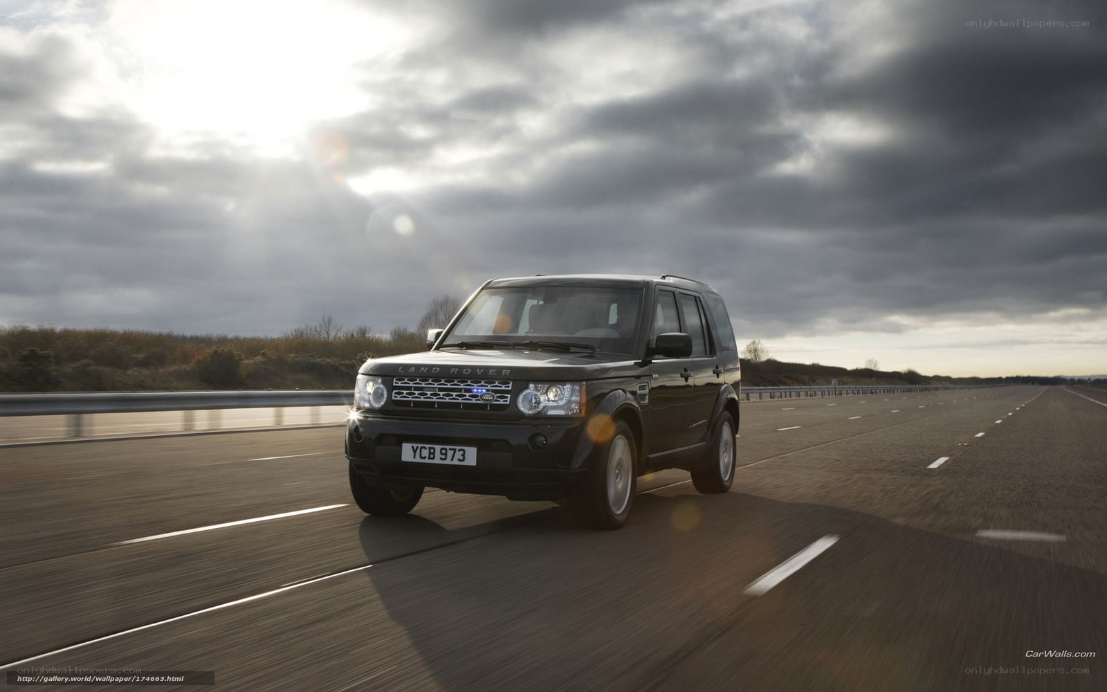 Land Rover driving on highway