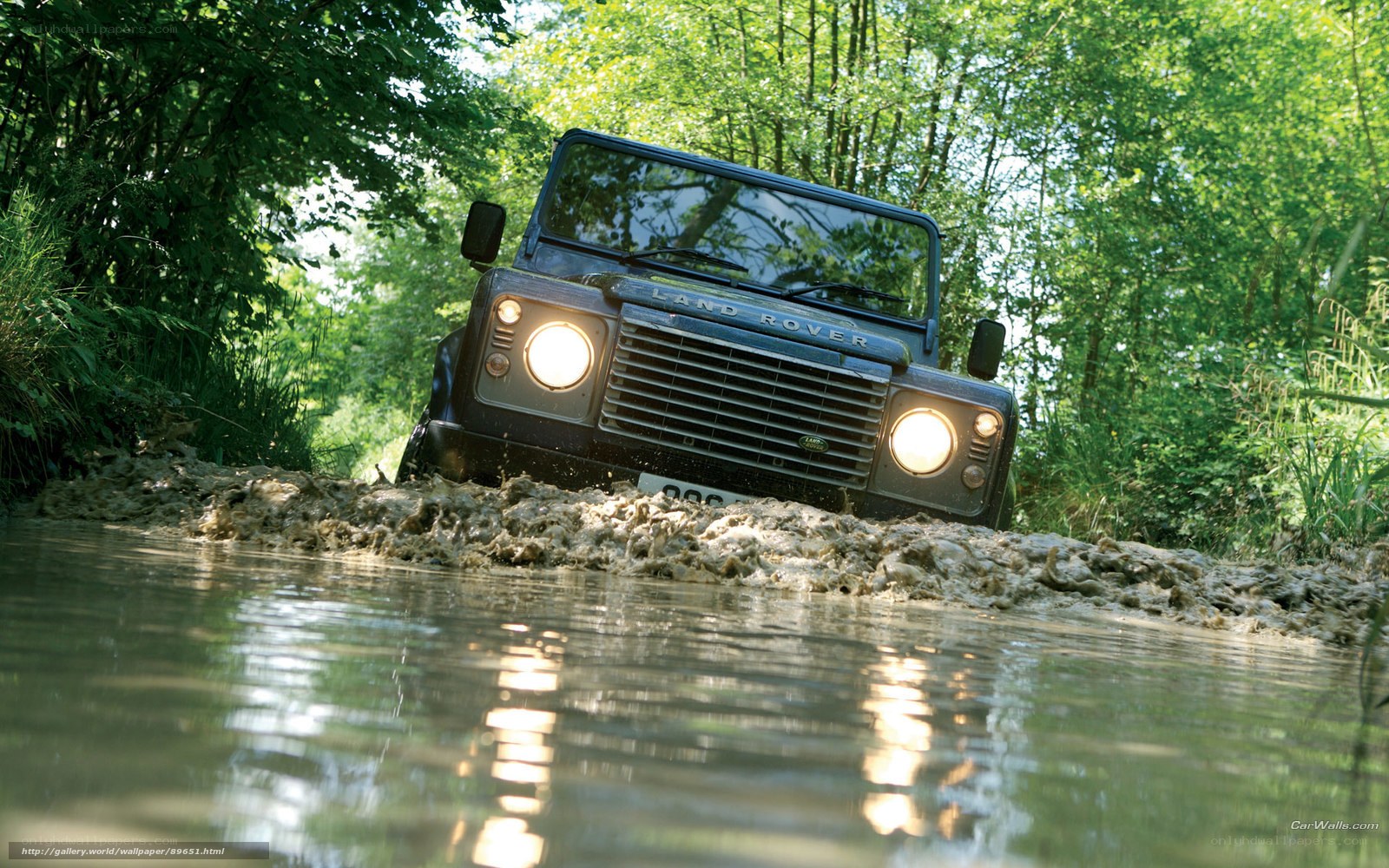 Land Rover driving through water