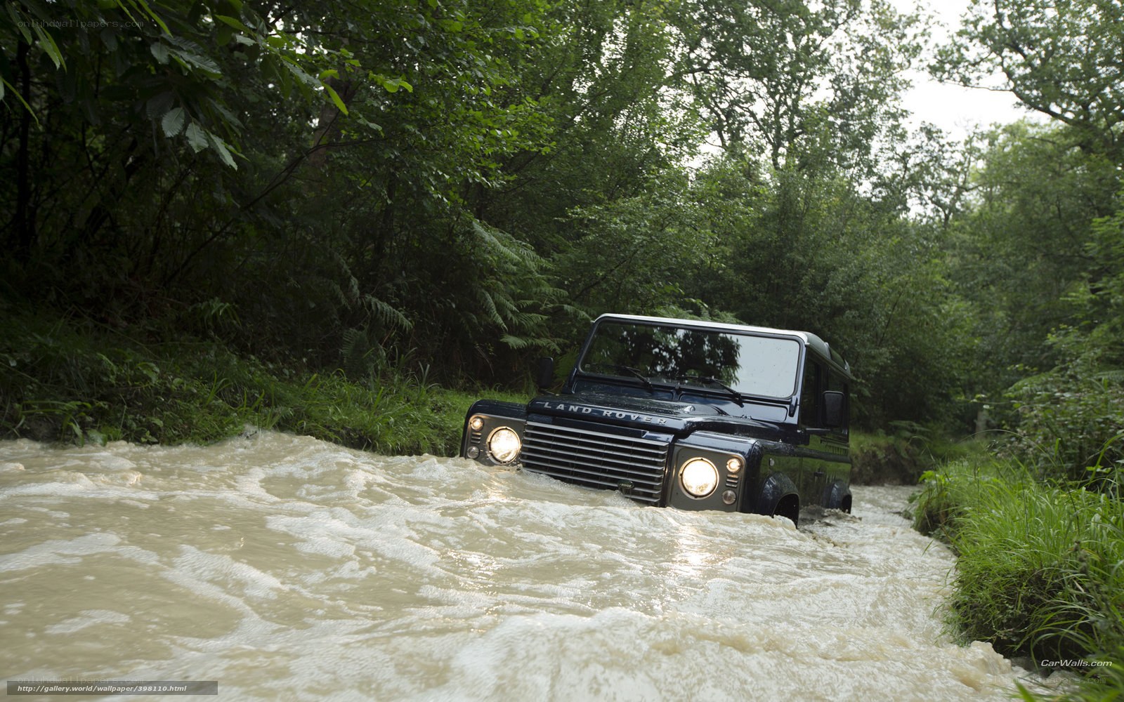 Land Rover fording a river