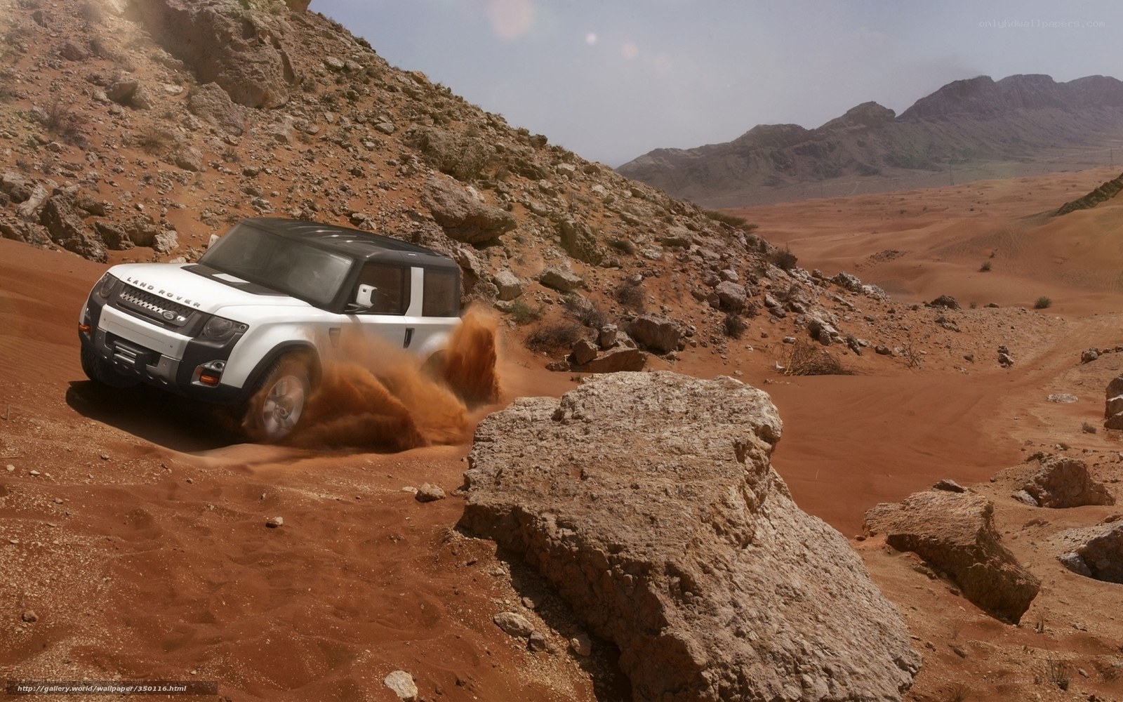 Land Rover in desert terrain