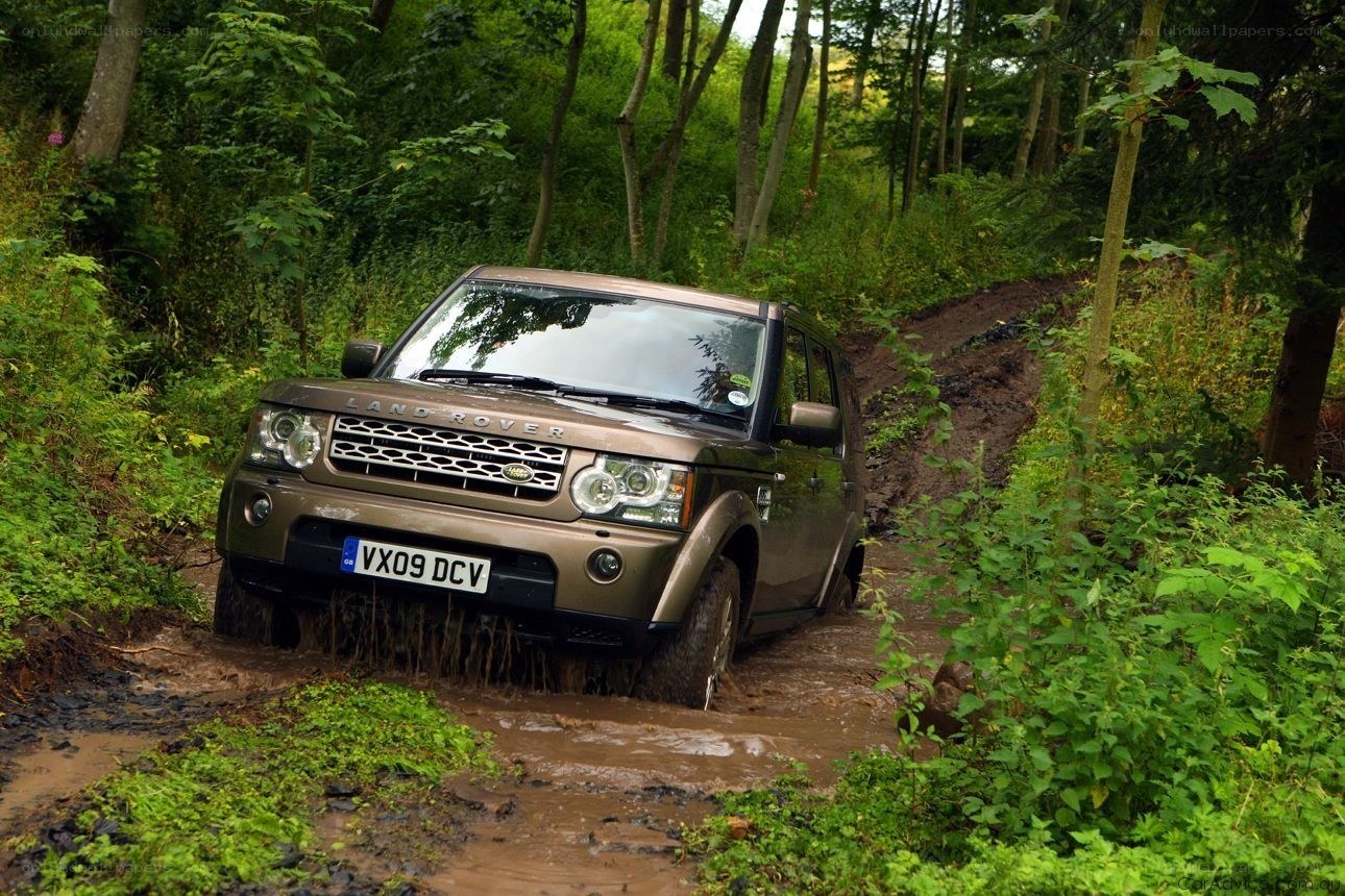 Land Rover in muddy forest