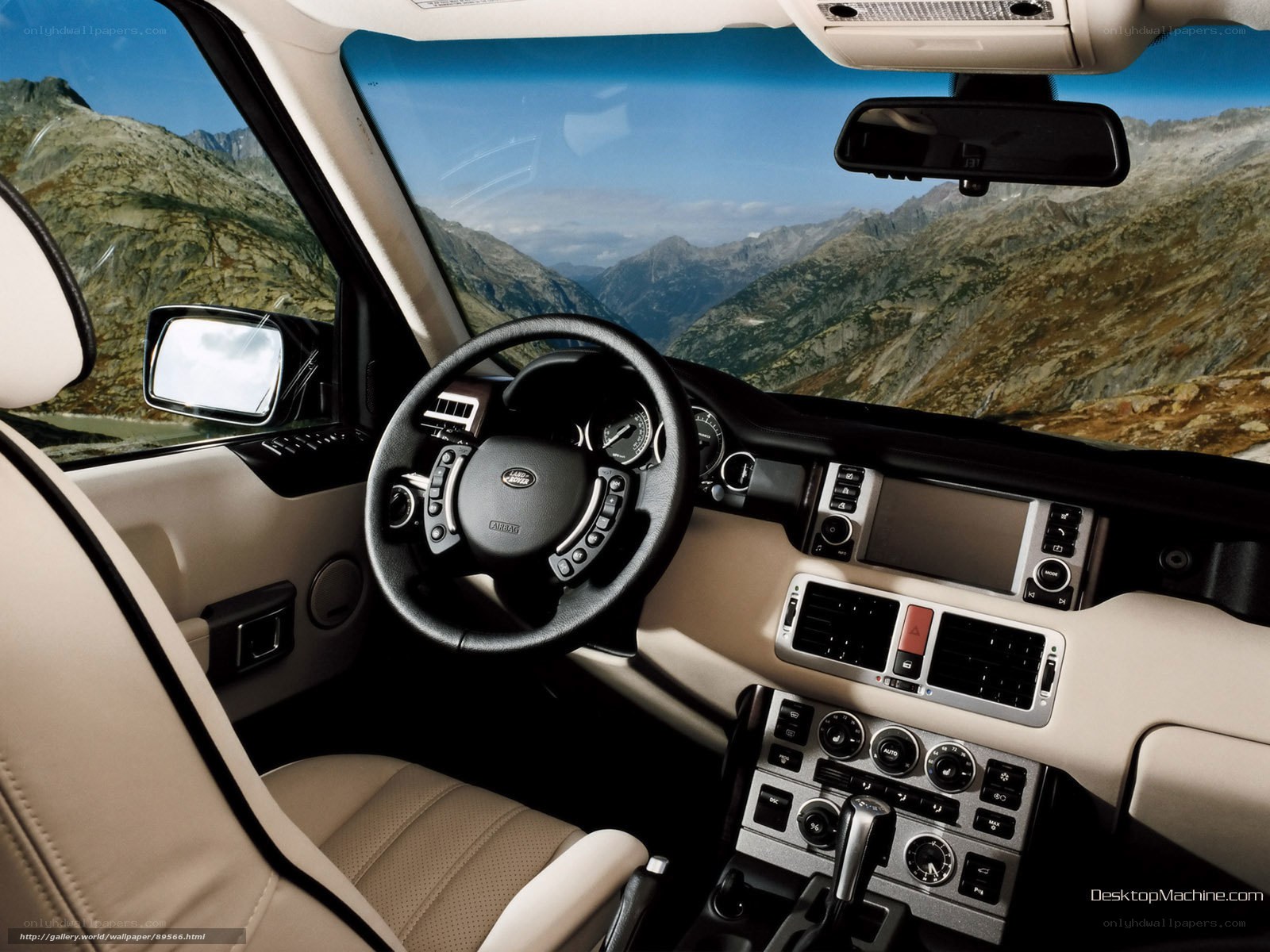 Land Rover interior with mountain view