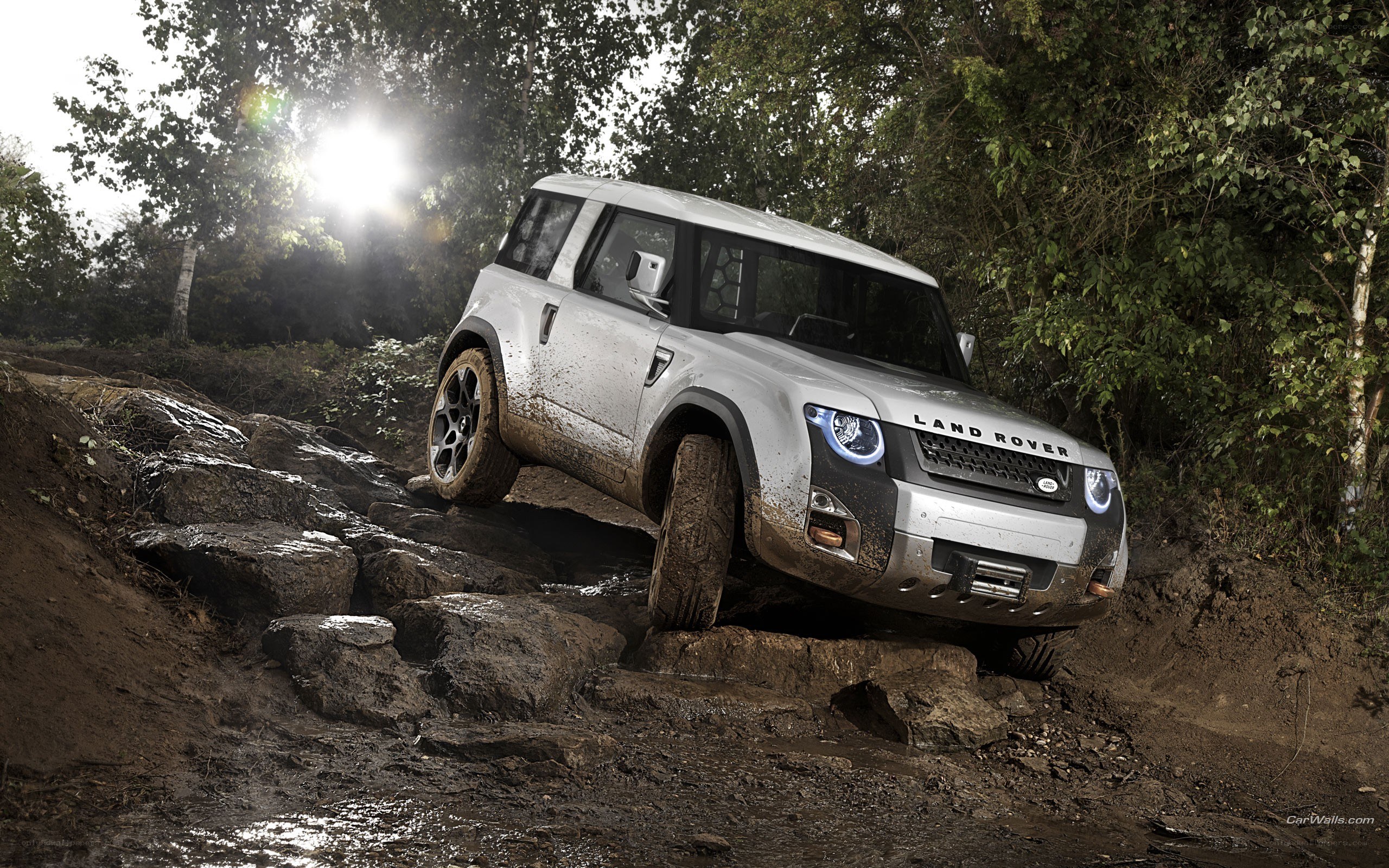 Land Rover navigating rocky terrain