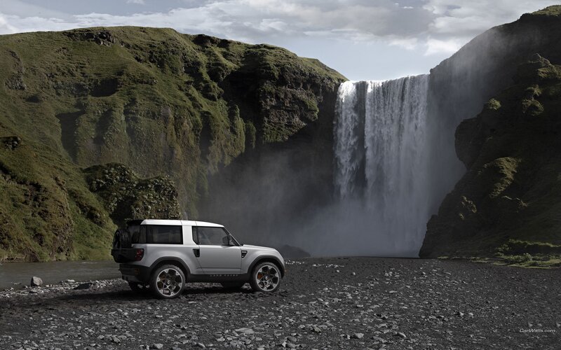 Land Rover near waterfall