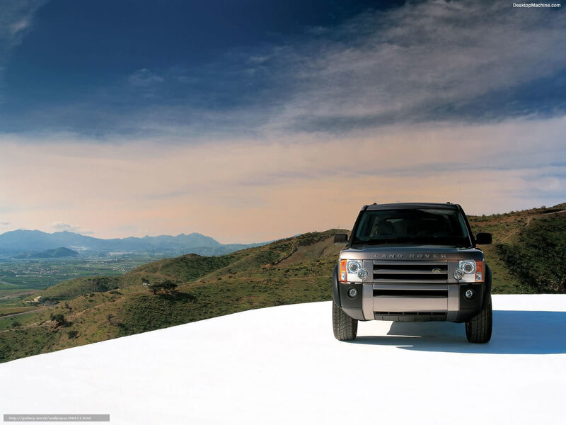 Land Rover on a white hill