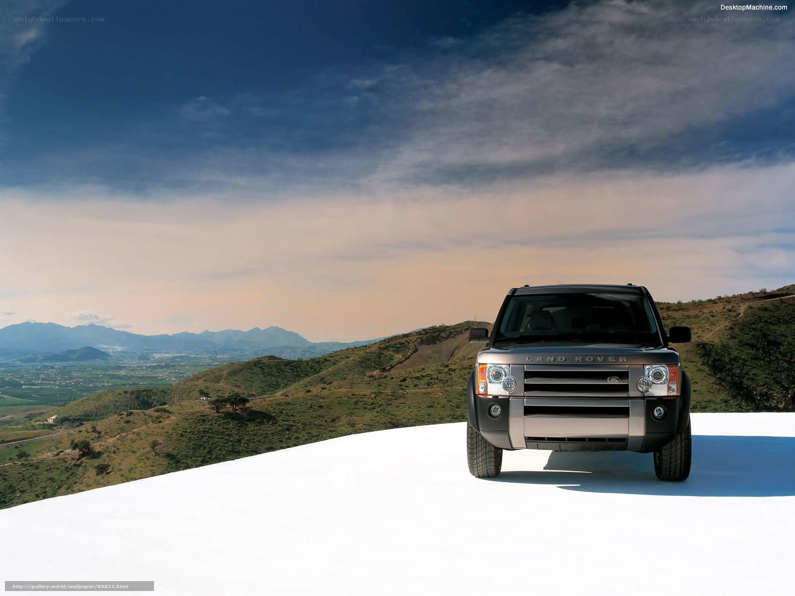 Land Rover on a white hill