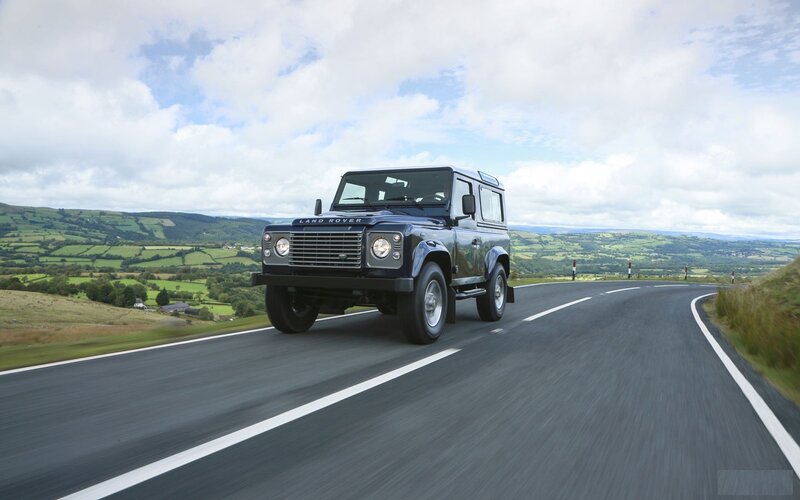Land Rover on a winding road