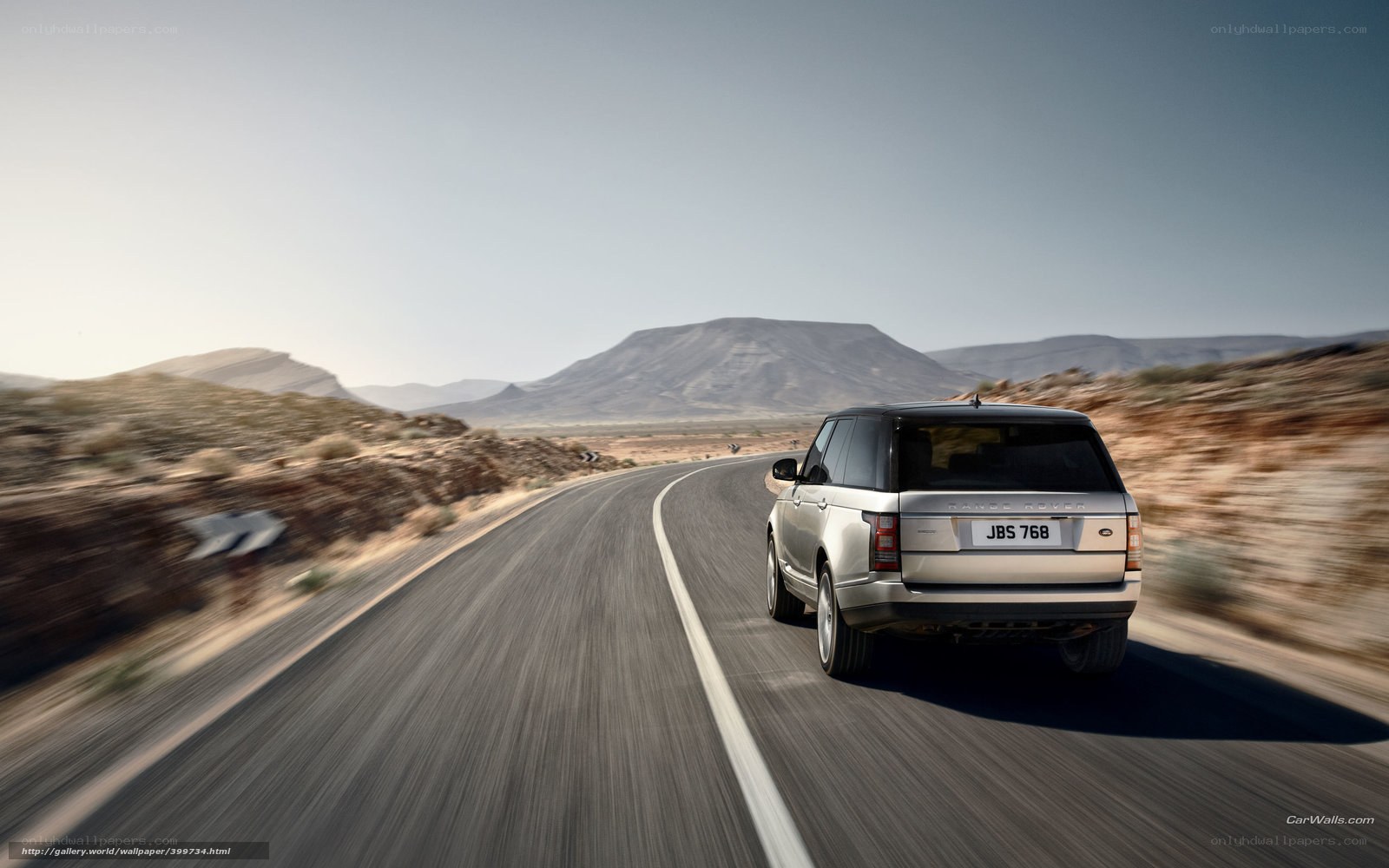 Land Rover on desert road