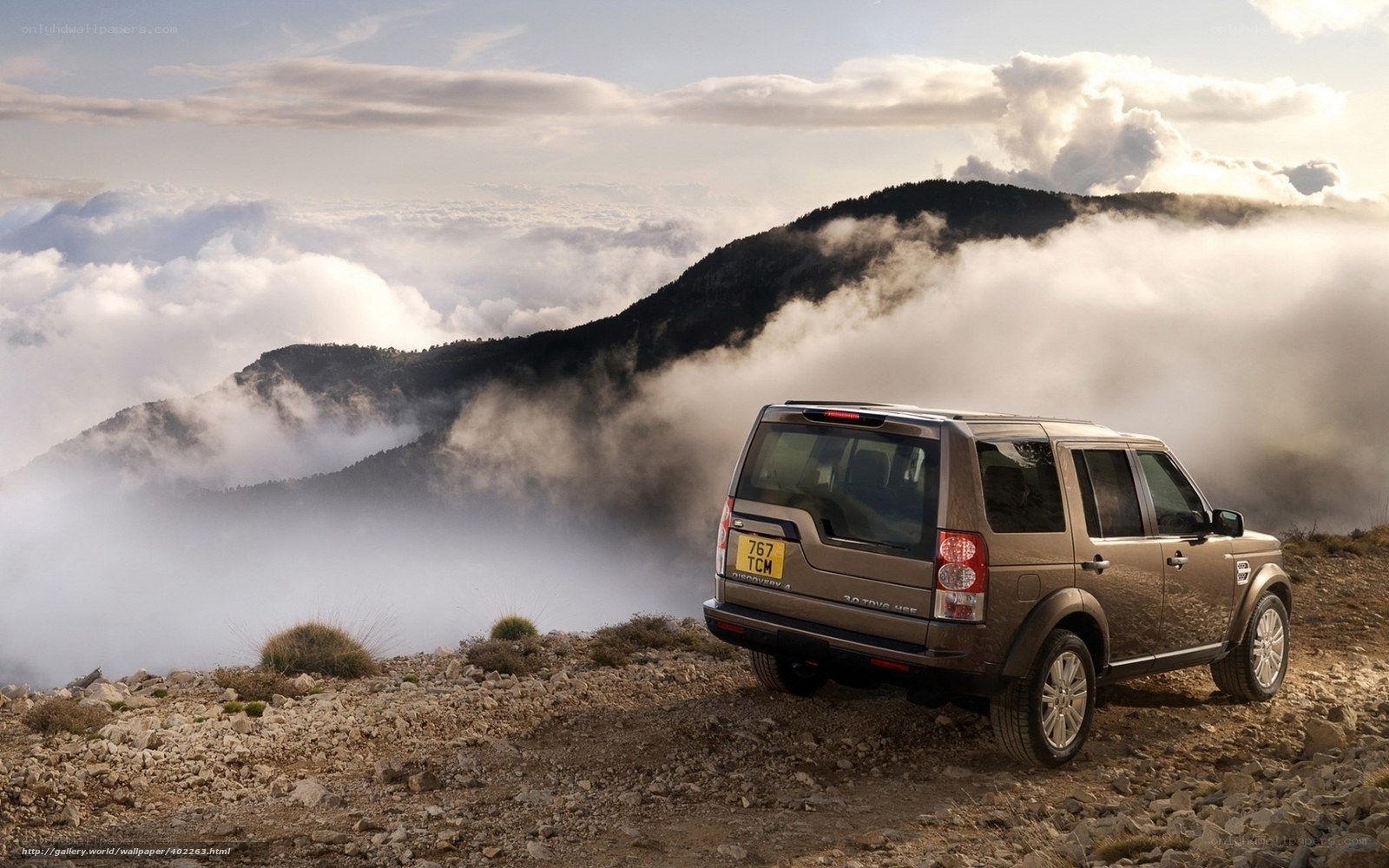 Land Rover on mountain peak