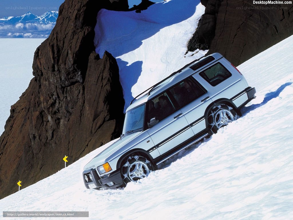 Land Rover on snowy mountain