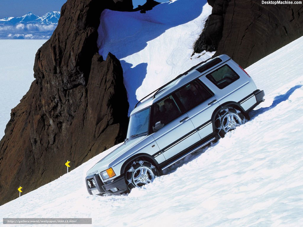 Land Rover on snowy mountain