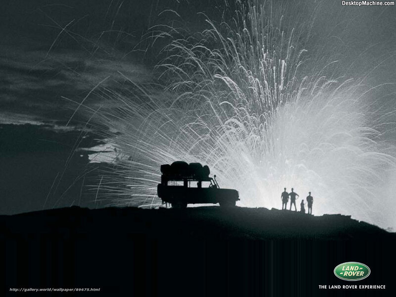 Land Rover silhouetted against eruption