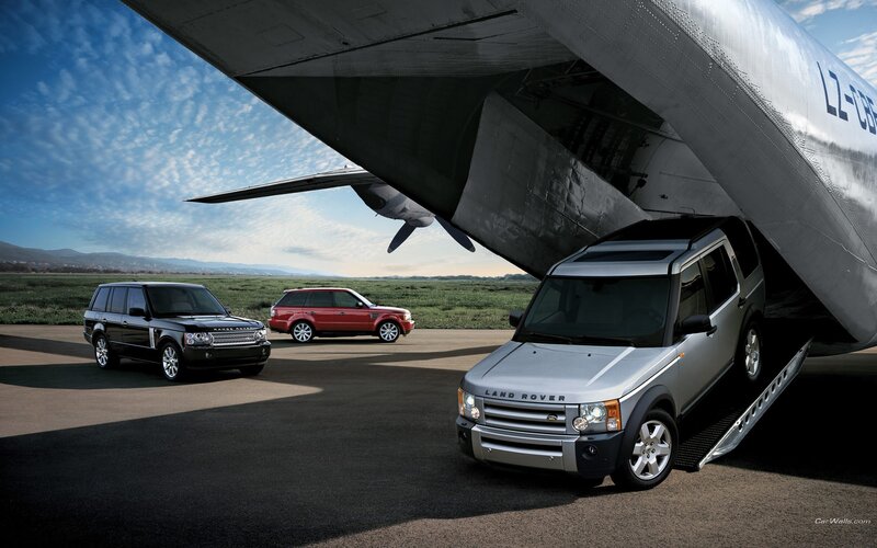 Land Rover vehicles at airfield