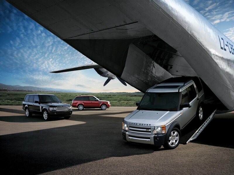 Land Rover vehicles at airfield