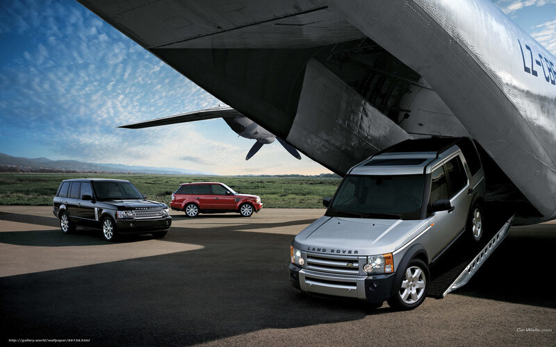 Land Rover vehicles at airfield