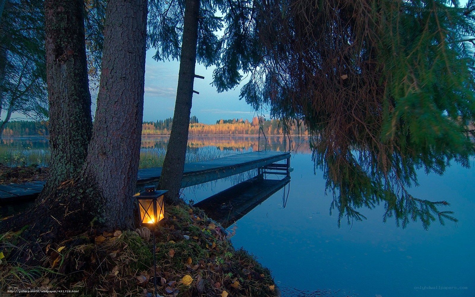 Lantern by the lake at dusk