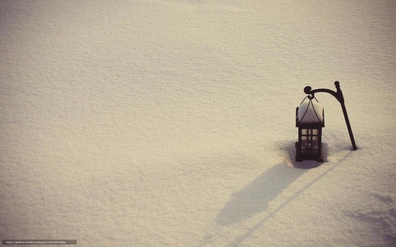 lantern in snowy landscape