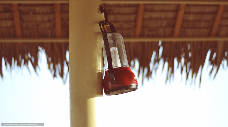 Lantern under thatched roof