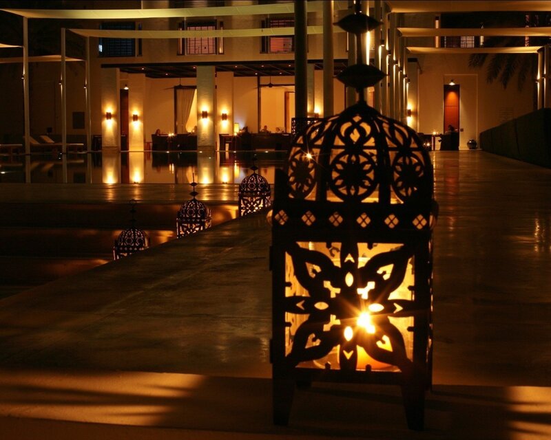 Lanterns by the pool at night