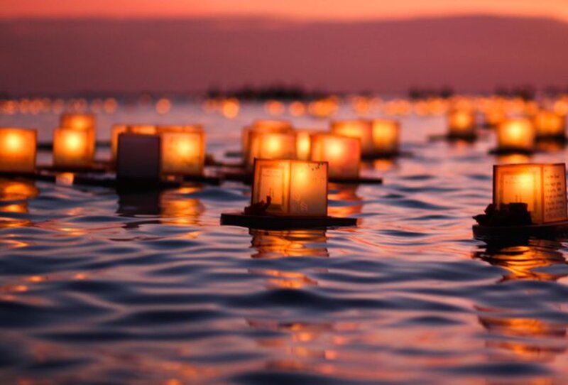 Lanterns Floating on Water — Orange, Serene, Sunset, Photograph, Sky, Light