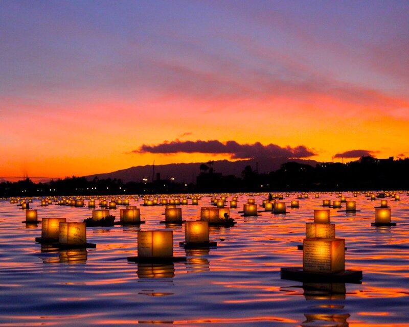 Lanterns Floating on Water — Orange, Serene, Sunset, Photograph, Sky, Mountain