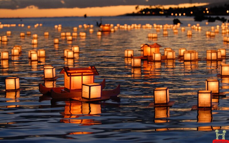 Lanterns Floating on Water — Orange, Serene, Sunset, Photograph