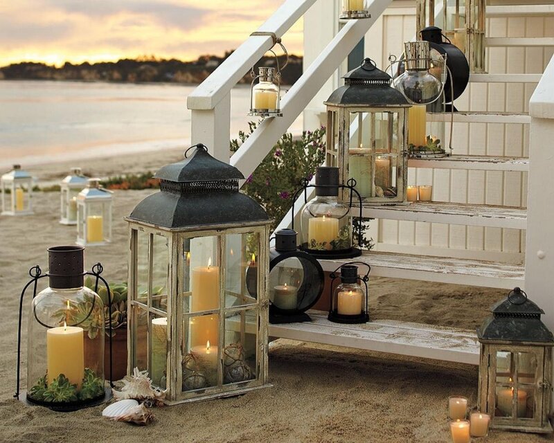 Lanterns on beach at sunset