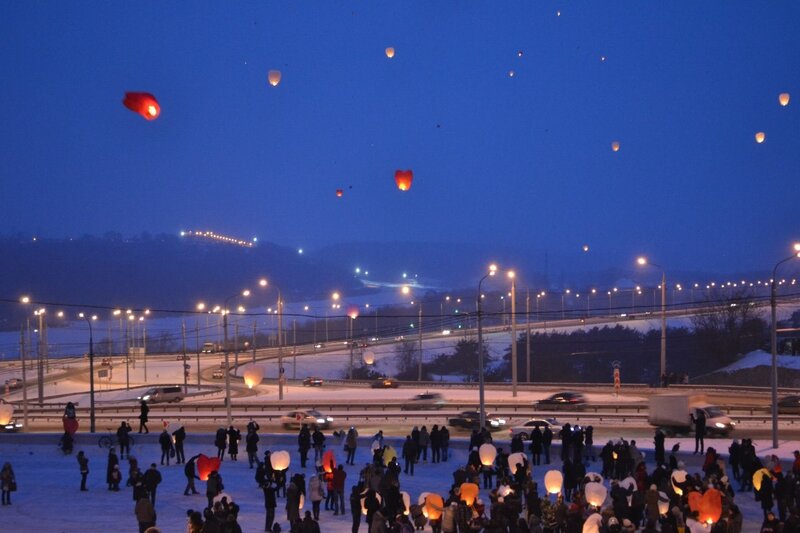 Lanterns over snowy highway
