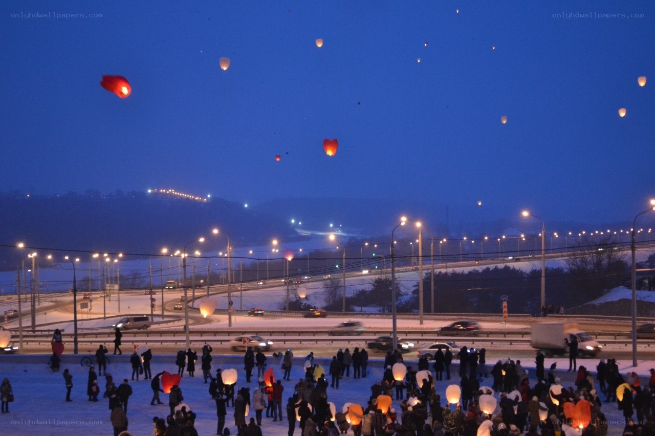 Lanterns over snowy highway