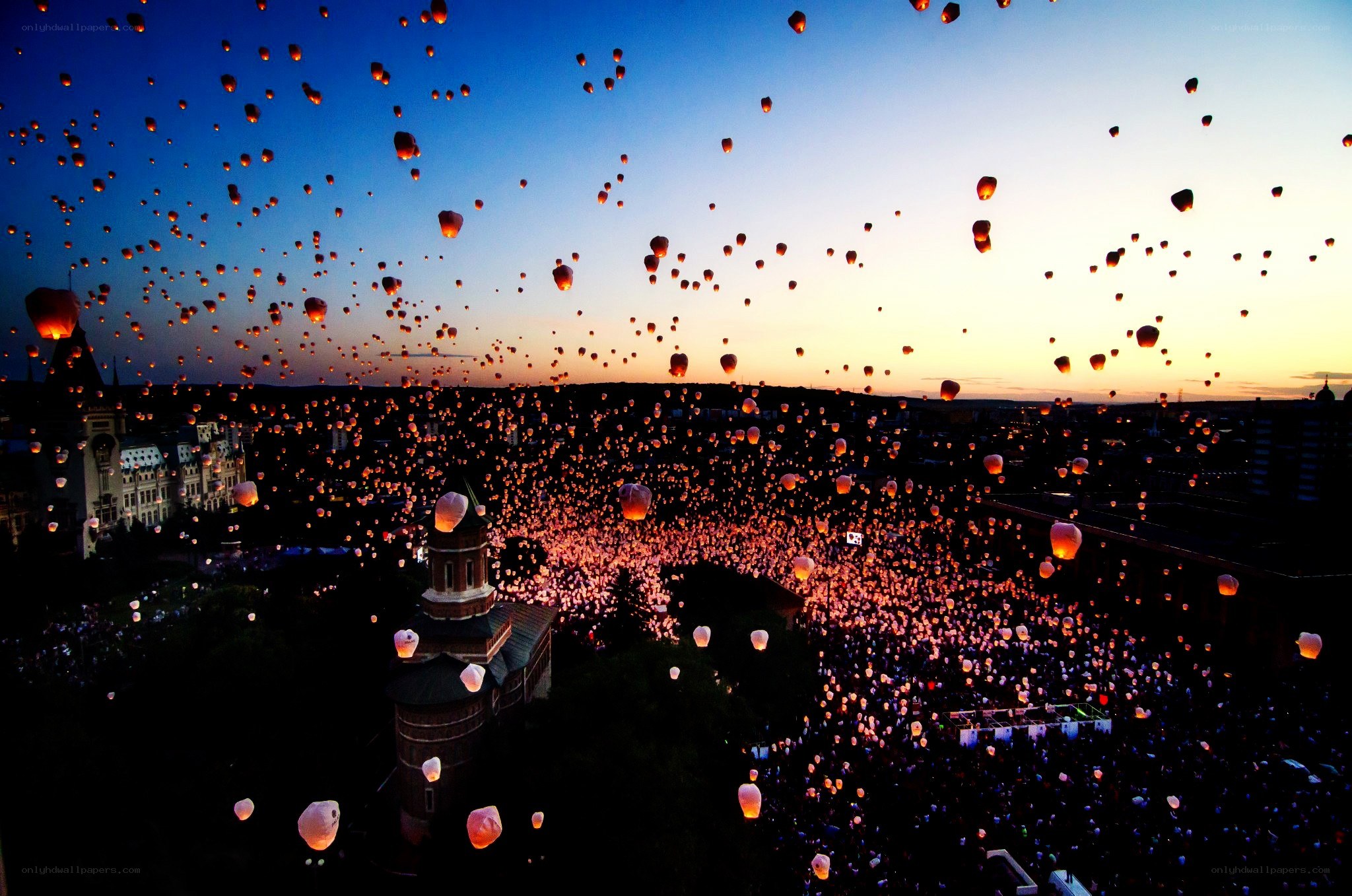 Lanterns over the city at dusk