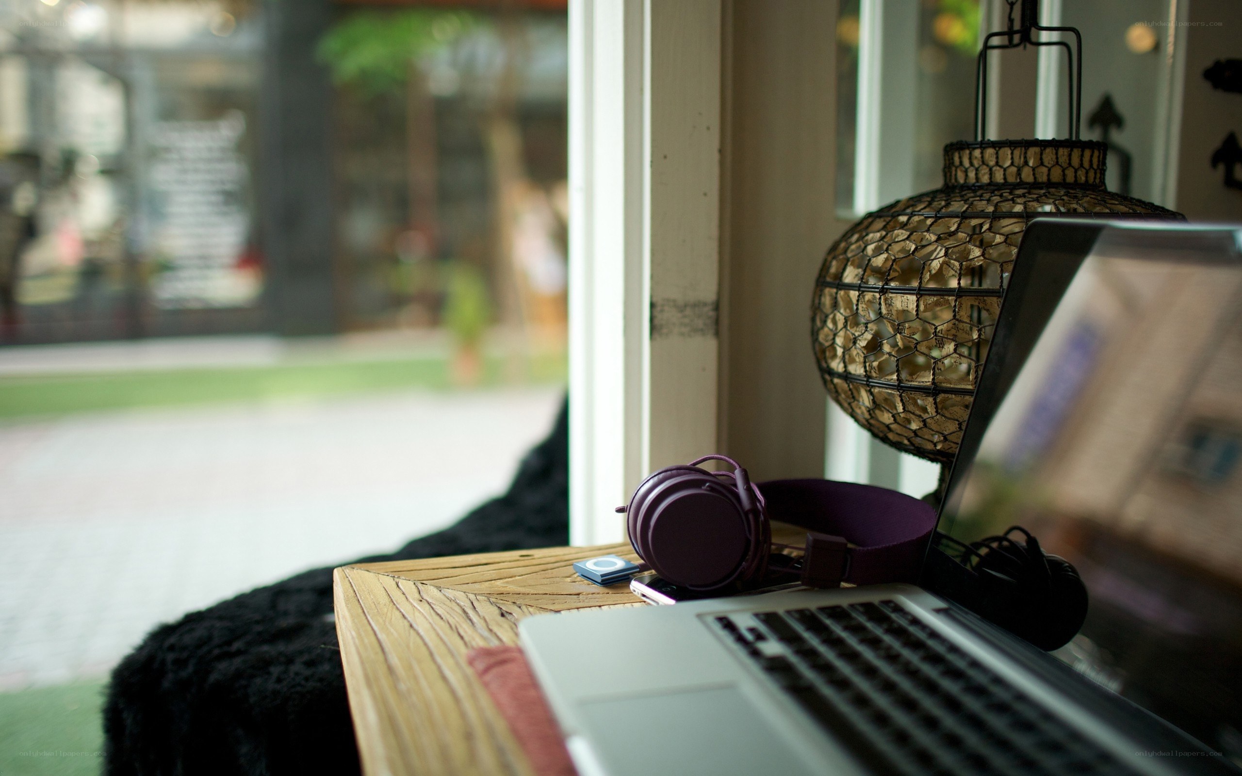Laptop and headphones on a table