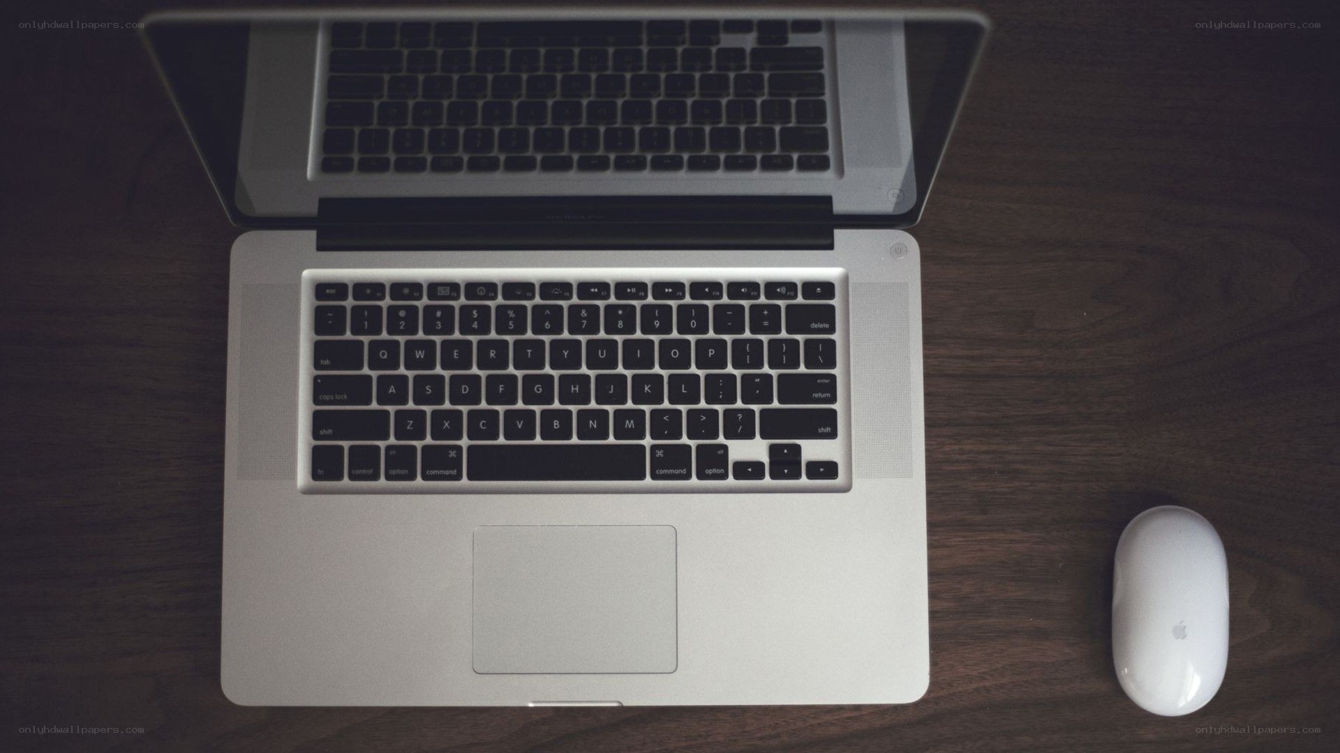 laptop and mouse on desk