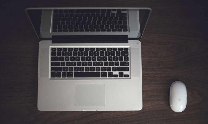 Laptop and Mouse on Desk — Silver