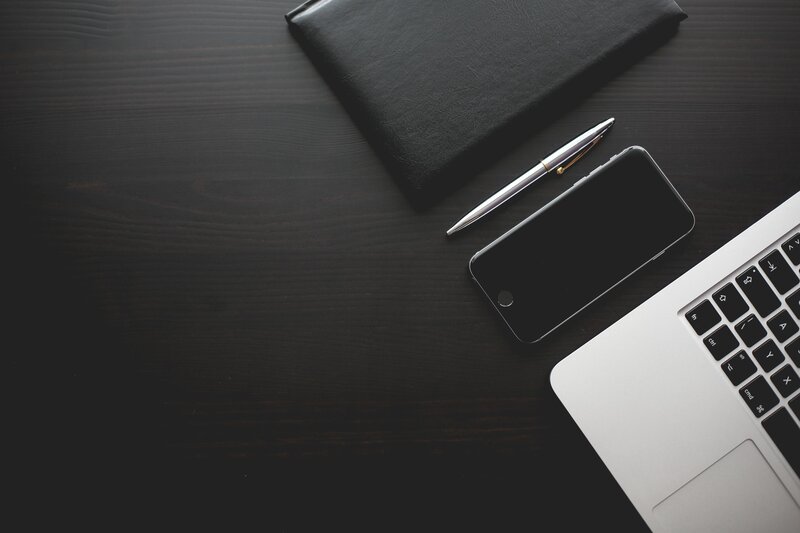 Laptop and Phone on Desk