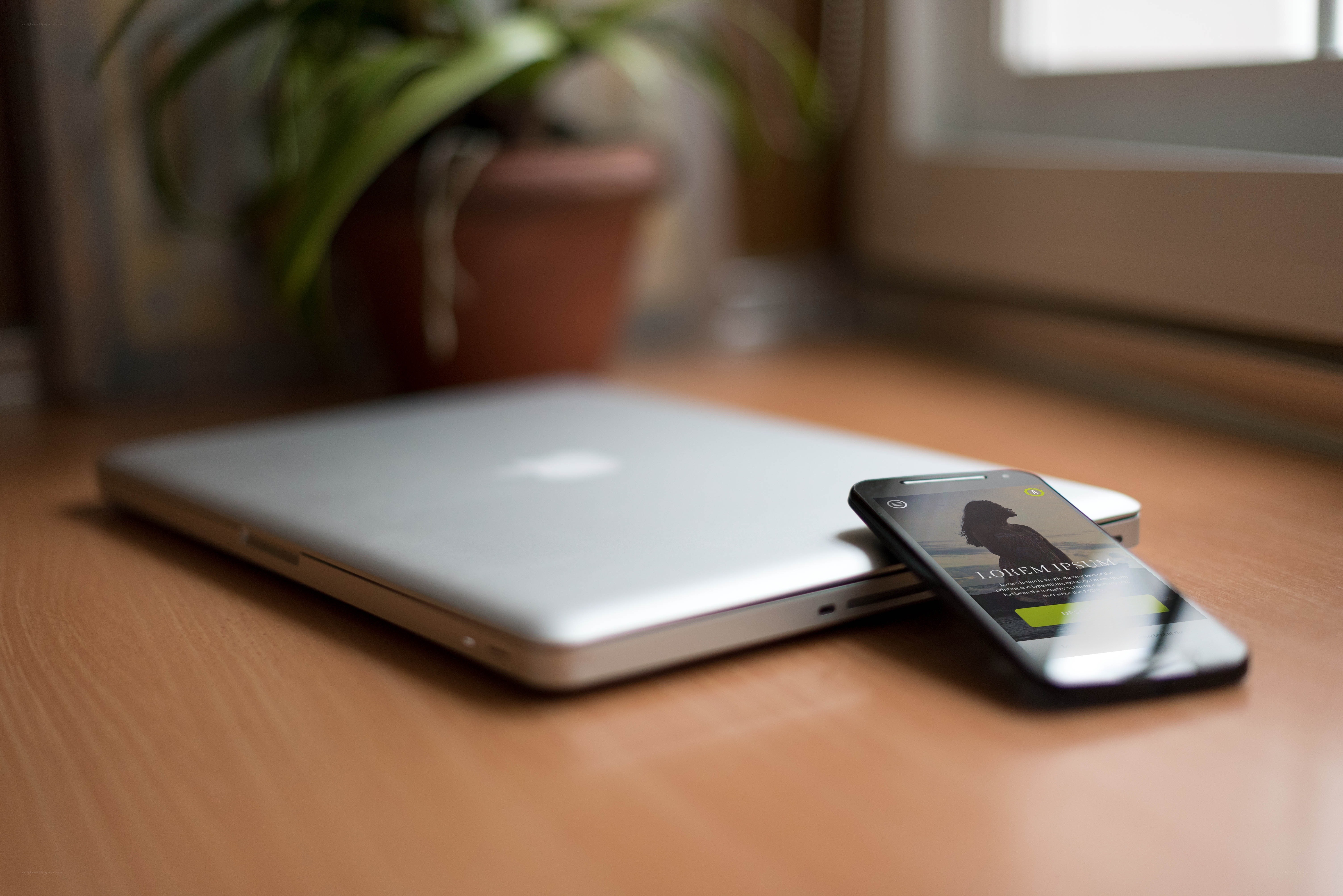 laptop and smartphone on desk