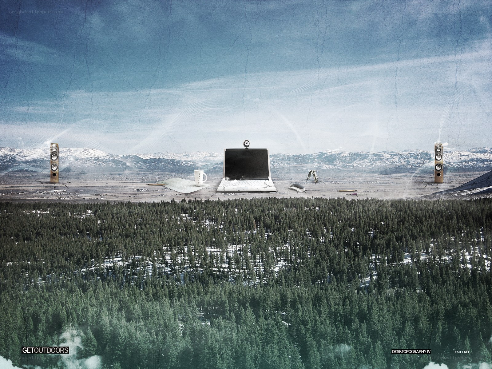 Laptop in a mountain landscape