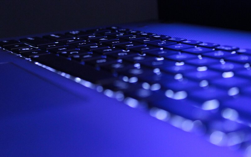 laptop keyboard with blue backlight