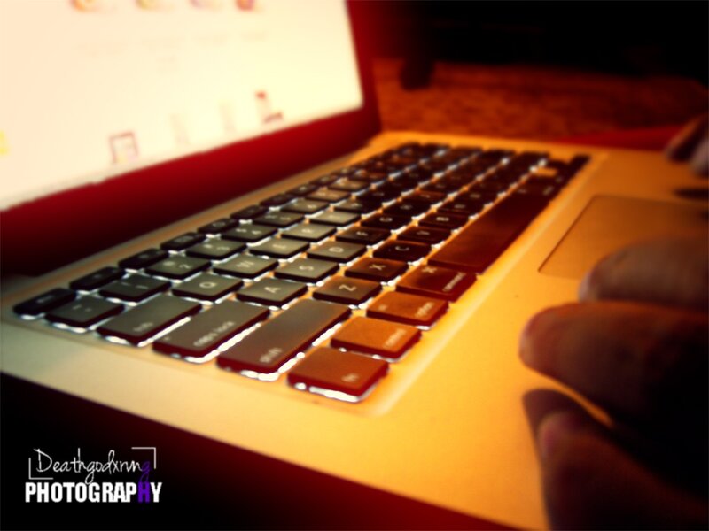 laptop keyboard with hand