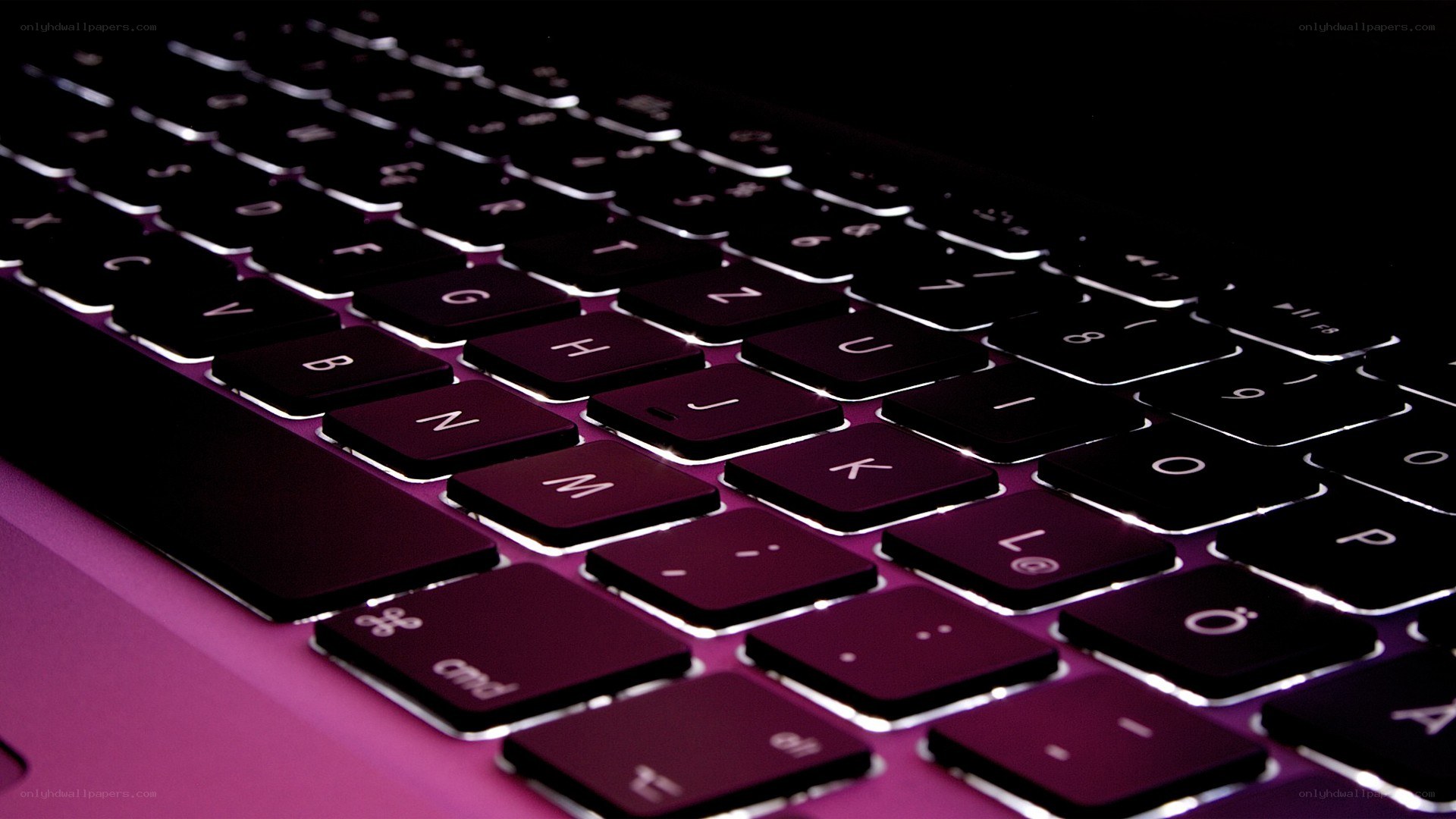laptop keyboard with purple backlight