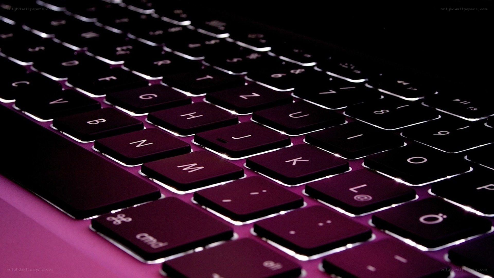 laptop keyboard with purple backlight