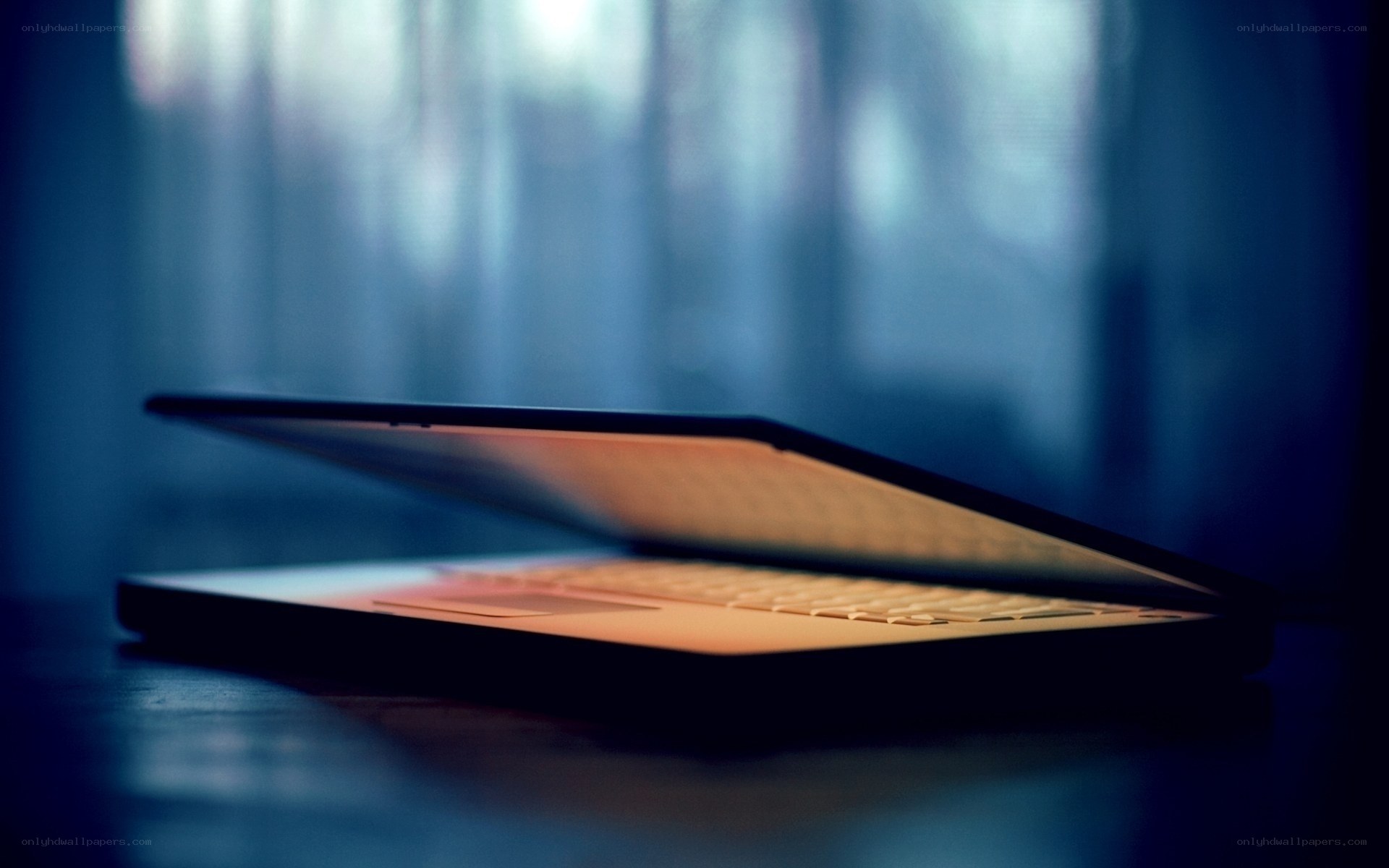 Laptop on a dark table