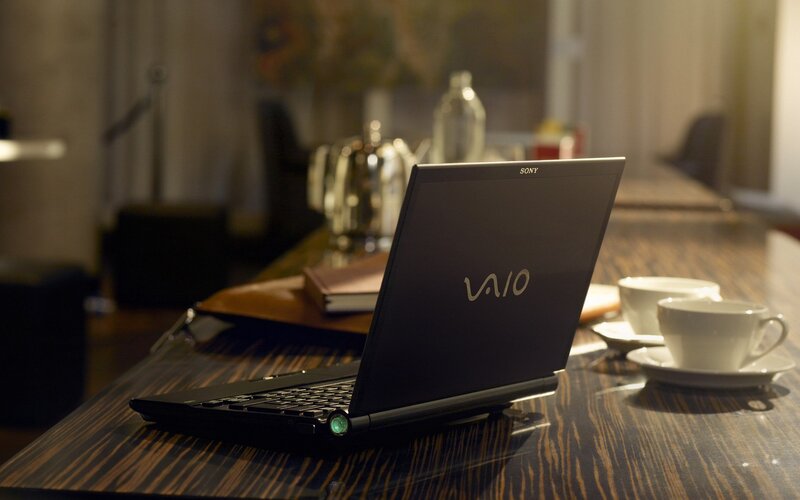 Laptop on a wooden table