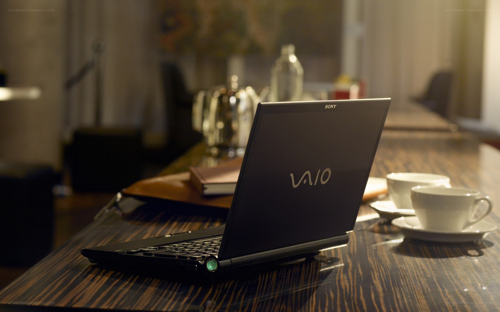 Laptop on a wooden table