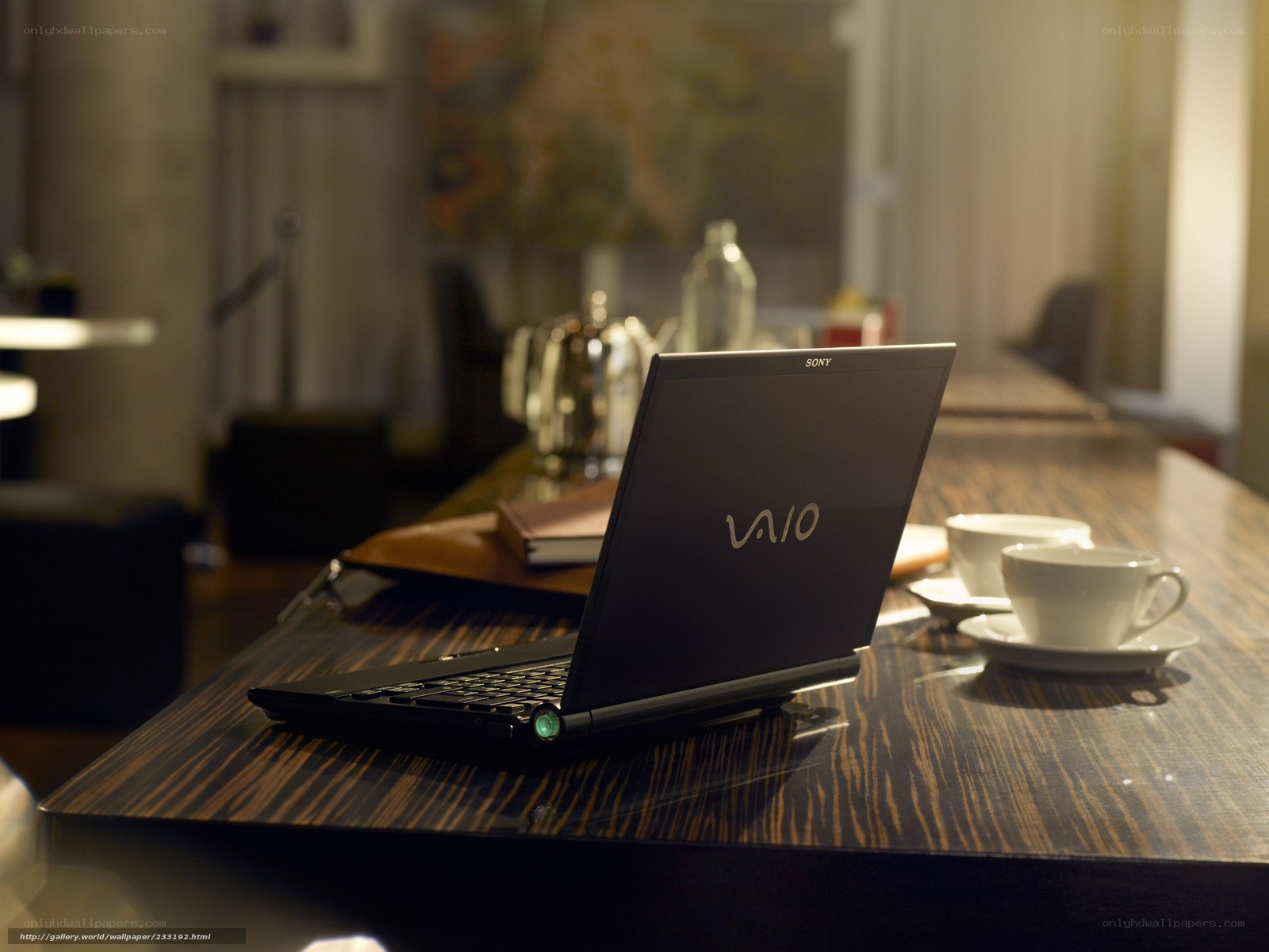 Laptop on a wooden table