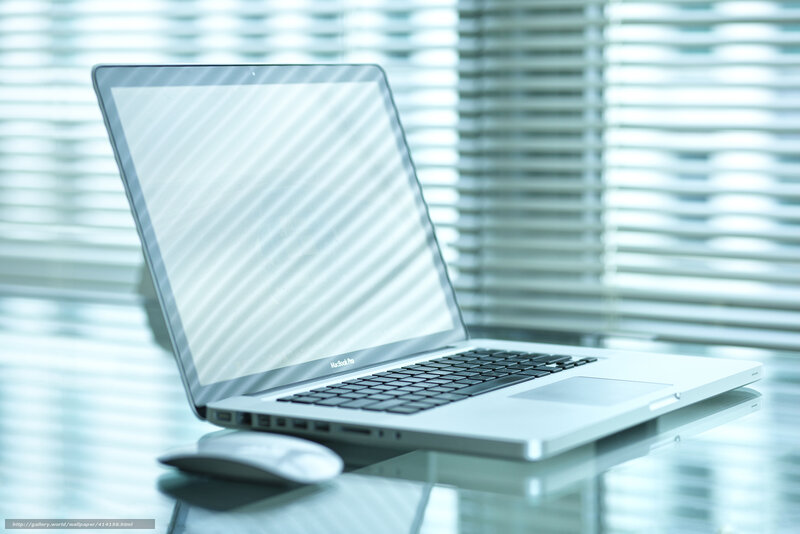 laptop on glass table